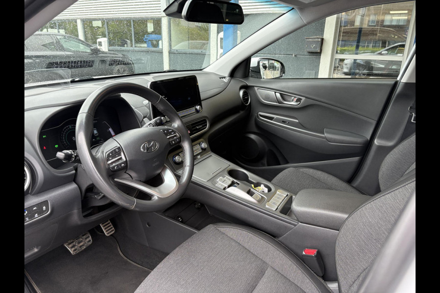 Hyundai Kona EV Fashion 64 kWh | Trekhaak | Warmtepomp | Head-Up | 3Fase | Krell | Dodehoeksensoren | Camera |