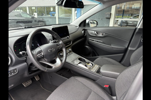 Hyundai Kona EV Fashion 64 kWh | Trekhaak | Warmtepomp | Head-Up | 3Fase | Krell | Dodehoeksensoren | Camera |