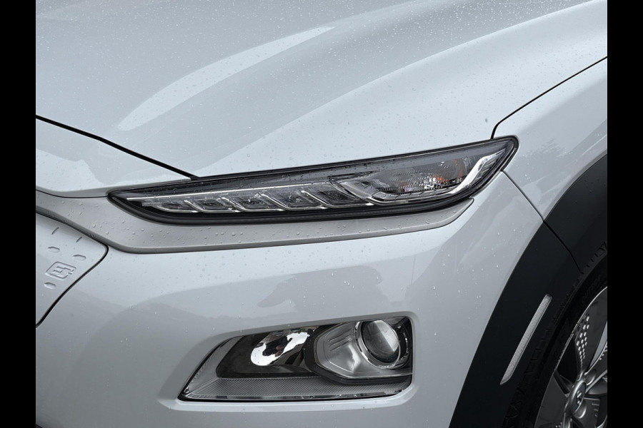 Hyundai Kona EV Fashion 64 kWh | Trekhaak | Warmtepomp | Head-Up | 3Fase | Krell | Dodehoeksensoren | Camera |
