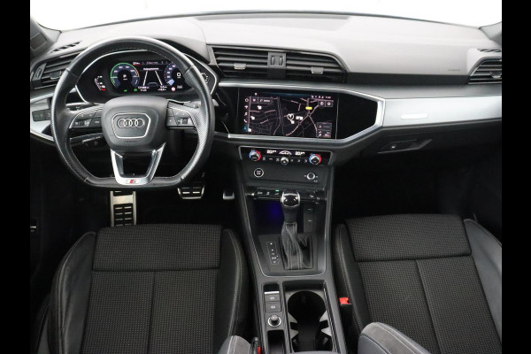 Audi Q3 45 TFSIe S edition | SOH 88% | Sportstoelen | Carplay | Trekhaak | Virtual Cockpit | Navigatie | Camera | Full LED | Half leder | Sfeerverlichting | Climate control | Parkeeerhulp | Cruise control | PHEV | Plug In