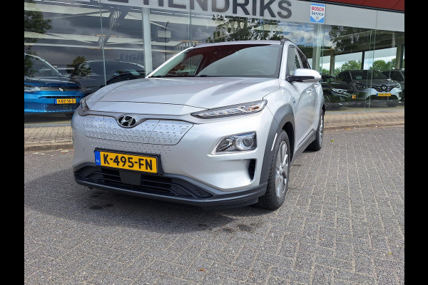 Hyundai Kona EV Fashion 64 kWh | SOH: nnb | 3 fase | Warmtepomp | Trekhaak | Camera | Adaptive CC | Blindspot |