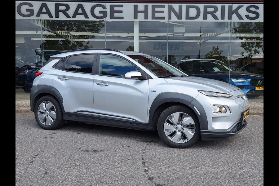 Hyundai Kona EV Fashion 64 kWh | SOH: nnb | 3 fase | Warmtepomp | Trekhaak | Camera | Adaptive CC | Blindspot |