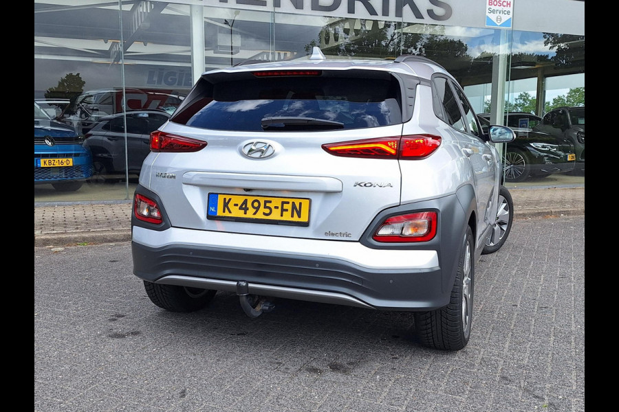 Hyundai Kona EV Fashion 64 kWh | SOH: nnb | 3 fase | Warmtepomp | Trekhaak | Camera | Adaptive CC | Blindspot |