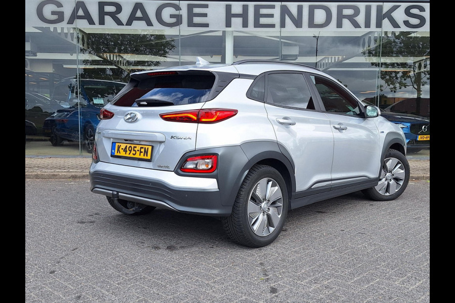 Hyundai Kona EV Fashion 64 kWh | SOH: nnb | 3 fase | Warmtepomp | Trekhaak | Camera | Adaptive CC | Blindspot |