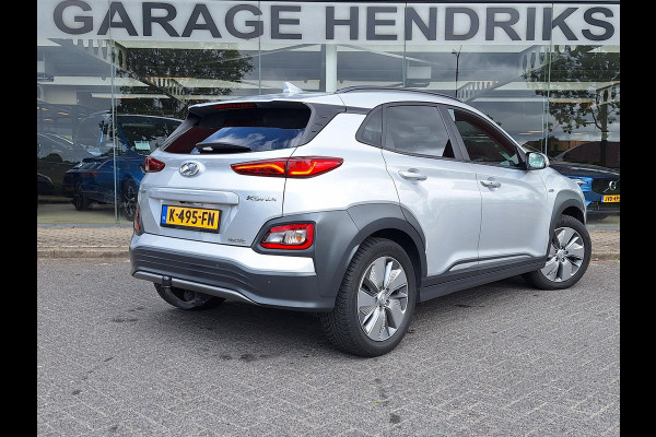 Hyundai Kona EV Fashion 64 kWh | SOH: nnb | 3 fase | Warmtepomp | Trekhaak | Camera | Adaptive CC | Blindspot |