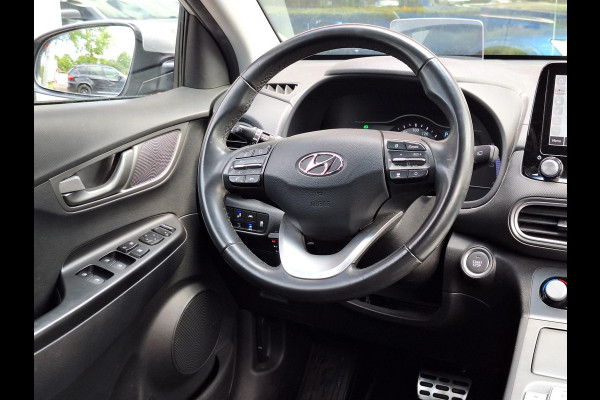 Hyundai Kona EV Fashion 64 kWh | SOH: nnb | 3 fase | Warmtepomp | Trekhaak | Camera | Adaptive CC | Blindspot |