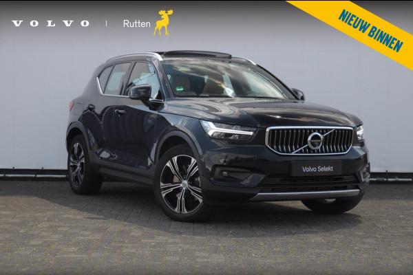 Volvo XC40 T5 272PK Automaat Plug-in hybrid Inscription Elektrische stoelen / Trekhaak / Panoramadak / Polestar tuning / Lederen bekleding / Adaptieve cruise control / Parkeersensoren met 360 camera / Harman Kardon audio / Mistlampen / Stoel - en stuurwielverwarming