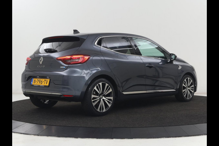 Renault Clio 1.6 E-Tech Hybrid 140 Initiale Paris | Leder | Stoelverwarming | Carplay | Keyless | Park Assist | Full LED | Navigatie | Climate control | Stuurverwarming | DAB | Bluetooth