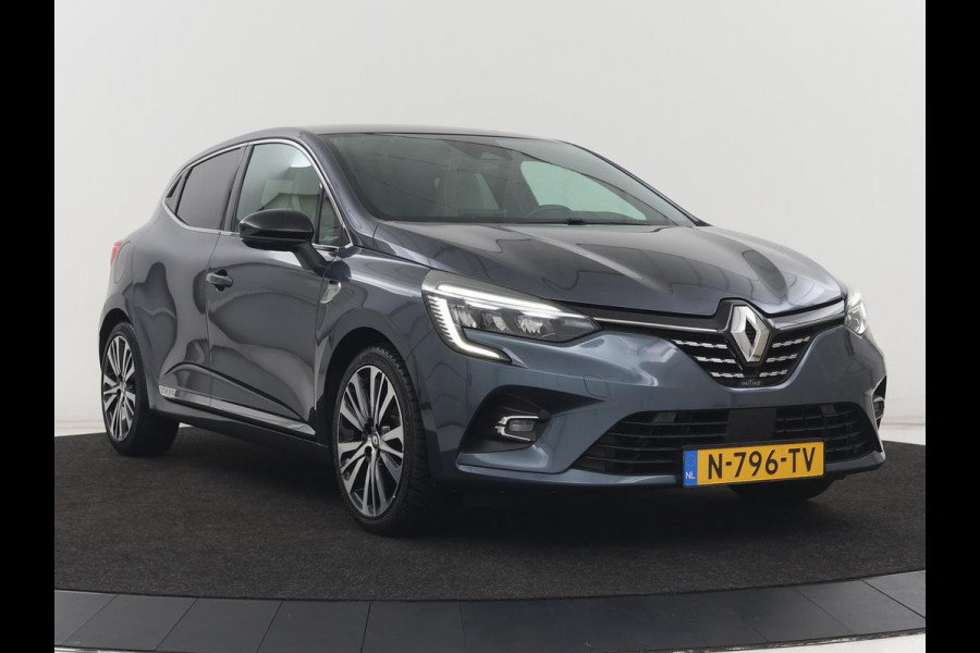 Renault Clio 1.6 E-Tech Hybrid 140 Initiale Paris | Leder | Stoelverwarming | Carplay | Keyless | Park Assist | Full LED | Navigatie | Climate control | Stuurverwarming | DAB | Bluetooth