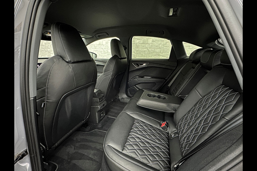 Audi Q4 e-tron 45 265pk Quattro RS-Leder | Uniek Interieur! | Sportstoelen | ACC | Sonos-Sound | Head-Up | 95% SOH | Sportstoelen | Keyless-Ent Memory | Groot Navi | Virtual-Cockpit | Getint Glas | 3-Zone Clima | Zwarte Hemel | LED | Carplay | Standkachel | Achteruitrij-Camera | Stoelverwarming |