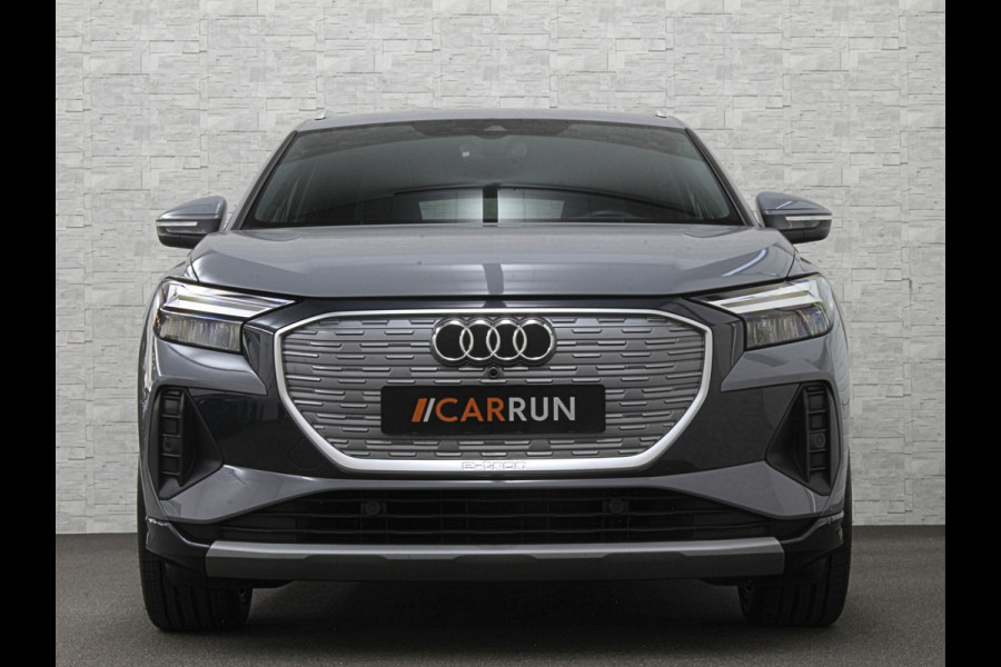 Audi Q4 e-tron 45 265pk Quattro RS-Leder | Uniek Interieur! | Sportstoelen | ACC | Sonos-Sound | Head-Up | 95% SOH | Sportstoelen | Keyless-Ent Memory | Groot Navi | Virtual-Cockpit | Getint Glas | 3-Zone Clima | Zwarte Hemel | LED | Carplay | Standkachel | Achteruitrij-Camera | Stoelverwarming |