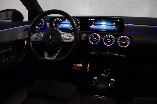 Mercedes-Benz A-Klasse 220 190PK AUTOMAAT BUSINESS SOLUTION AMG | PANORAMA SCHUIF/KANTEL DAK | SFEER VERLICHTING VOOR + ACHTER | STOEL VERWARMING OP BEIDE VOORSTOELEN | MULTIBEAM LED KOPLAMPEN | ACHTERUITRIJ CAMERA | APPLE CARPLAY/ANDROID AUTO | NAVIGATIE | CRUISE CONTROL | NIGHT PAKKET | VERKEERSLICHTEN WEERGAVE | 17" LICHTMETALEN VELGEN AMG | HEMELBEKLEDING ZWART | MBUX MULTIMEDIA SYSTEEM | SPORTSTOELEN | PARKEERSENSOREN VOOR + ACHTER | DRAADLOZE TELEFOONLADER |