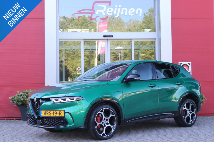 Alfa Romeo Tonale 1.5T Hybrid 160PK VELOCE | PREMIUM PACK: LEDEREN BEKLEDING/GEVENTILEERDE VOORSTOELEN/4-VOUDIG ELEKTRISCH VERSTELBARE LENDESTEUN VOORSTOELEN/ELEKTRISCH BEDIENBARE /HOOGGLANS ZWARTE RAAMOMLIJSTING/AMBIENT LIGHTING | TECHNOLOGY PACK: PARKEERWAARSCHUWING VOOR EN ACHTER/360° CAMERA/AUTOMATISCH INPARKEREN/ AUTONOMOUS DRIVING LEVEL 2: ADAPTIVE CRUISE CONTROL/LANE CENTERING ASSIST/TRAFFIC JAM ASSIST DODEHOEK DETECTIE AUTOMATISCH DIMMENDE BUITENSPIEGELS ELEKTRISCH BEDIENBARE ACHTERKLEP | WINTERPACK: STOELVERWARMING VOOR/STUURVERWARMING/VERWARMBARE RUITENSPROEIERS | 19" LICHTMET