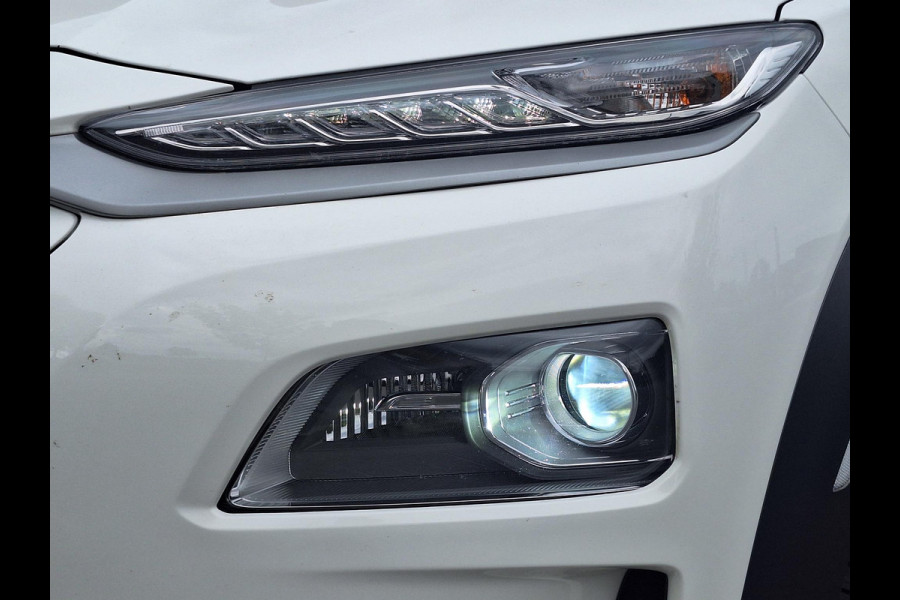 Hyundai Kona EV Premium 64 kWh | SOH: nnb | Warmtepomp | Lage km-stand | Leder | HUD | Blindspot | Full LED |