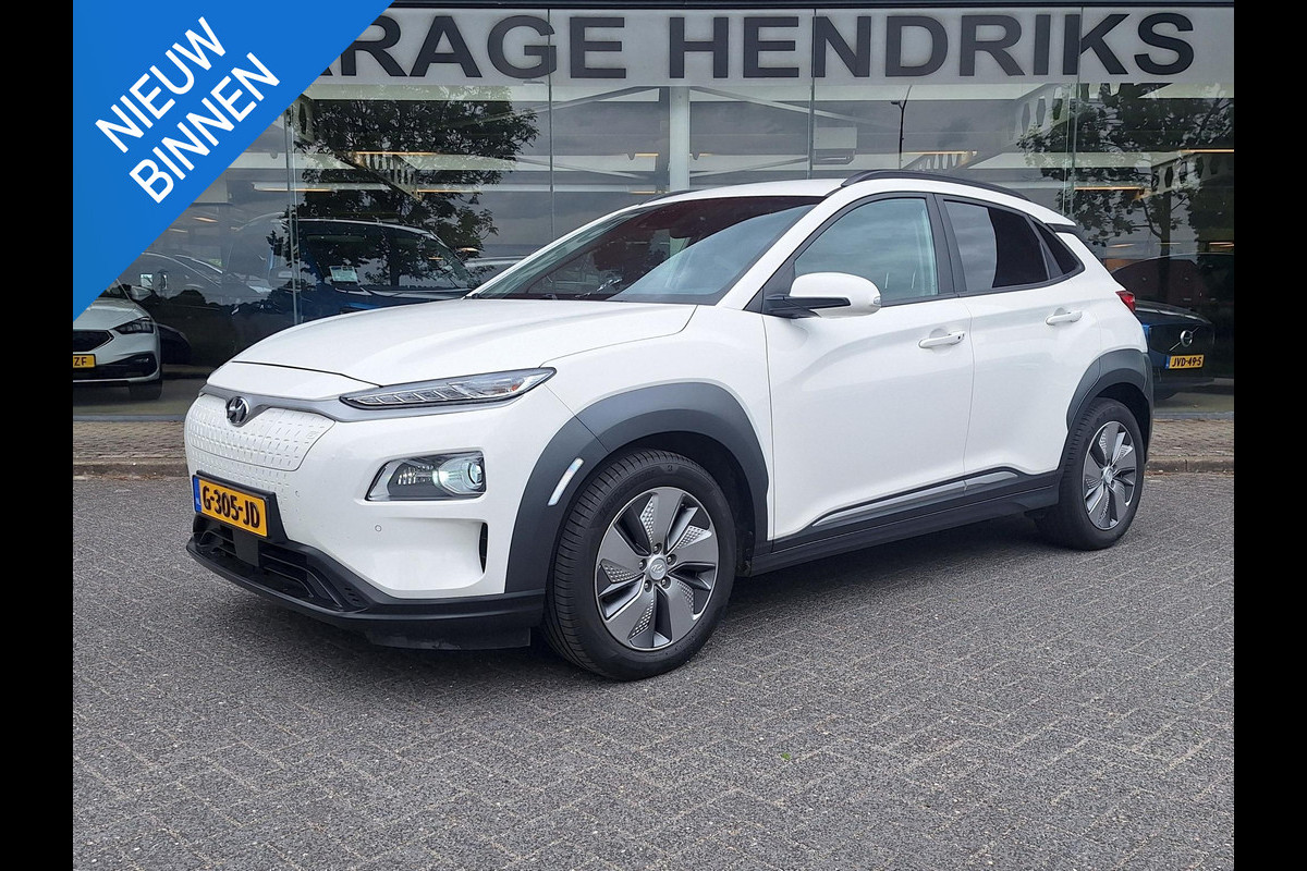 Hyundai Kona EV Premium 64 kWh | SOH: 96,8% | Warmtepomp | Lage km-stand | Leder | HUD | Blindspot | Full LED |