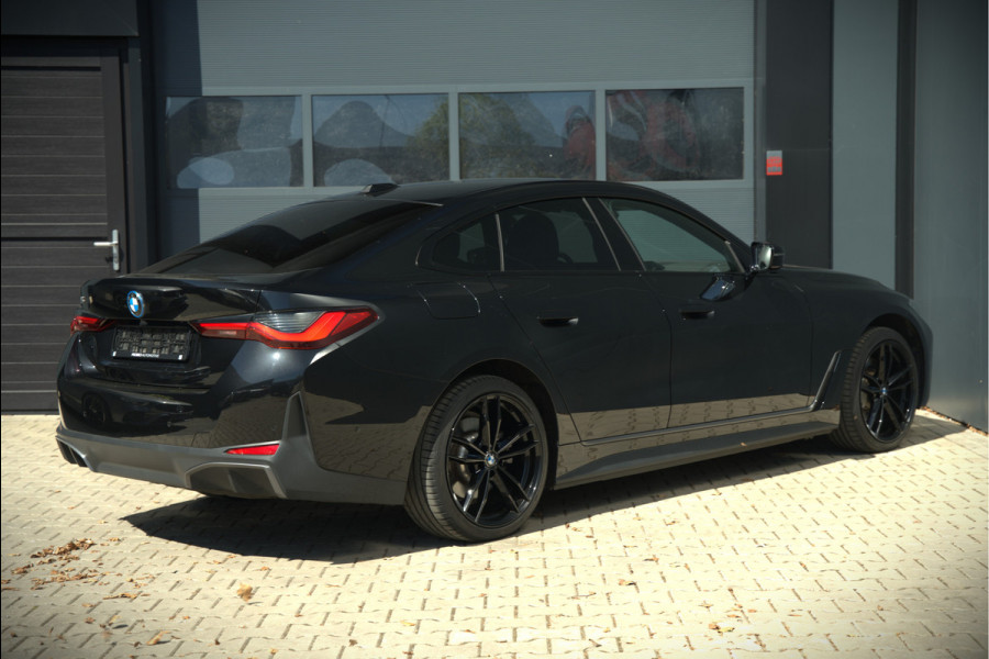 BMW i4 eDrive40 84 kWh | Stoelverwarming | Stuurverwarming | Apple Carplay | Adaptive Cruise Control | Memory Seat | Trekhaak | Camera | Parkeersensoren | Navigatie | Ambiance Verlichting | HIFI | SOH 96.52% |