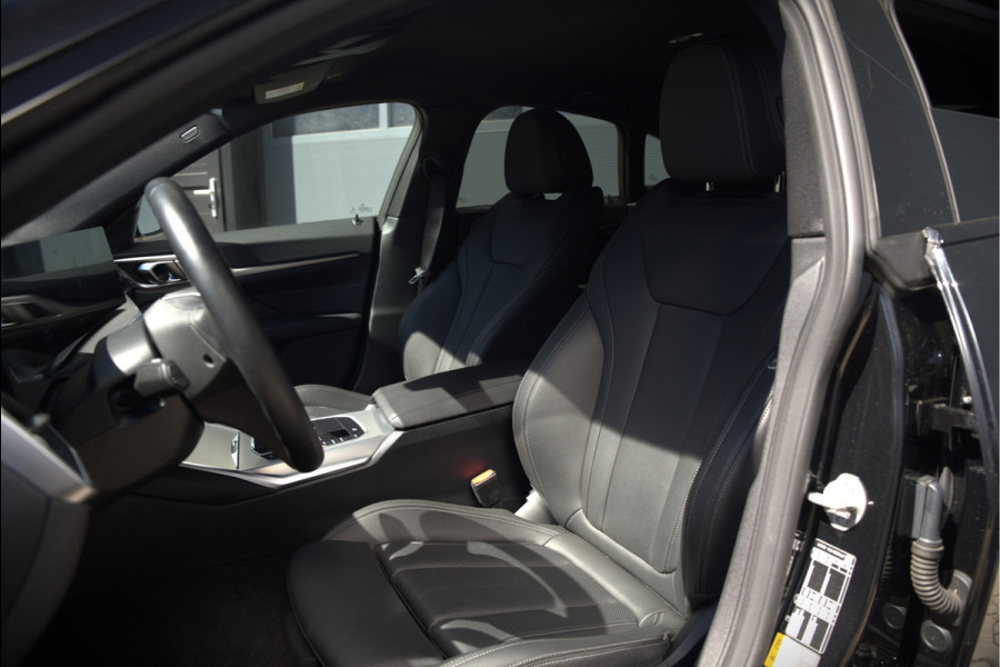 BMW i4 eDrive40 84 kWh | Stoelverwarming | Stuurverwarming | Apple Carplay | Adaptive Cruise Control | Memory Seat | Trekhaak | Camera | Parkeersensoren | Navigatie | Ambiance Verlichting | HIFI | SOH 96.52% |