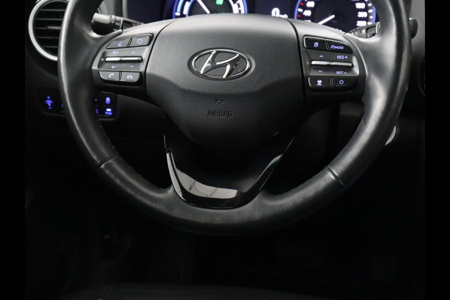 Hyundai Kona 1.6 GDI HEV Premium | 1e eigenaar | Stoelventilatie | Leder | Adaptive cruise | Head-Up | Trekhaak | Achterbankverwarming | Carplay | Navigatie | Keyless | Krell Audio | Side Assist | Stoelverwarming