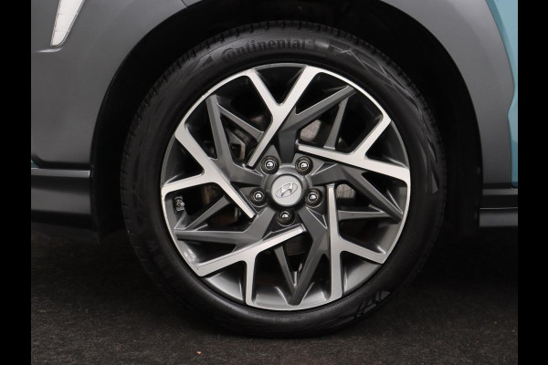 Hyundai Kona 1.6 GDI HEV Premium | 1e eigenaar | Stoelventilatie | Leder | Adaptive cruise | Head-Up | Trekhaak | Achterbankverwarming | Carplay | Navigatie | Keyless | Krell Audio | Side Assist | Stoelverwarming