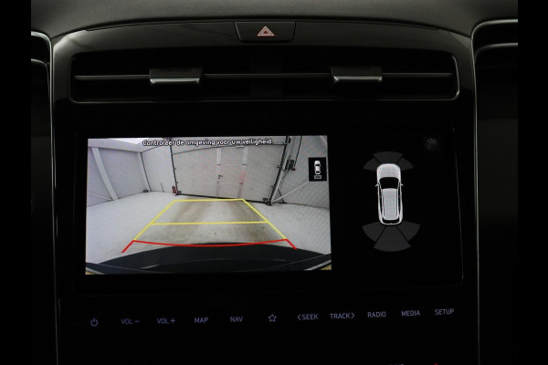 Hyundai Tucson 1.6 T-GDI PHEV Comfort 4WD | SOH 96% | Stoelverwarming | Trekhaak | Adaptive cruise | Camera | Carplay | Full LED | Navigatie | DAB | Keyless | Climate control | Plug In