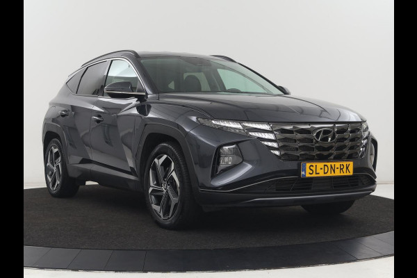 Hyundai Tucson 1.6 T-GDI PHEV Comfort 4WD | SOH 96% | Stoelverwarming | Trekhaak | Adaptive cruise | Camera | Carplay | Full LED | Navigatie | DAB | Keyless | Climate control | Plug In