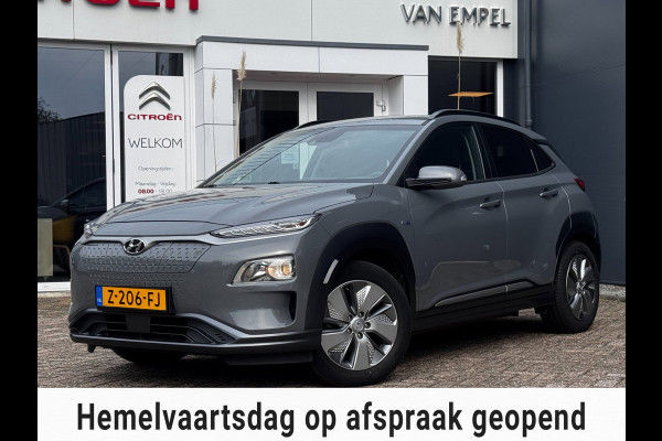 Hyundai Kona EV Comfort Smart 39 kWh | 100% SOH | Trekhaak | Camera | Stoel + Stuurverwarming | Navigatie
