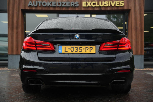 BMW 5 Serie M550i xDrive High Executive Schuifdak Adapt. Cruise Massage Harman/Kardon Stoelvent. 20''LM