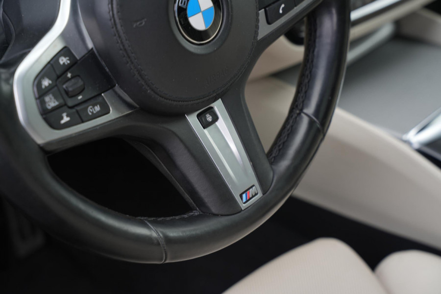 BMW 5 Serie M550i xDrive High Executive Schuifdak Adapt. Cruise Massage Harman/Kardon Stoelvent. 20''LM