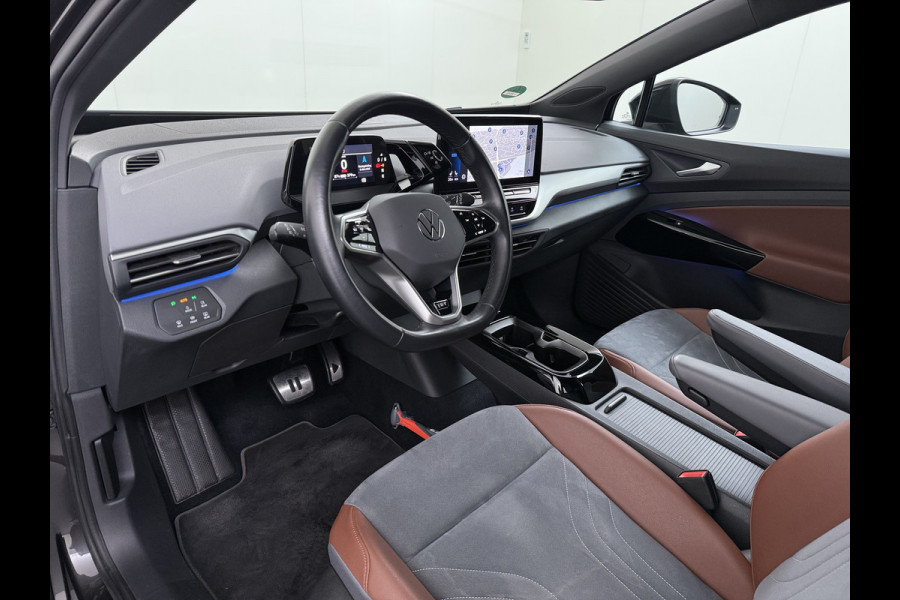 Volkswagen ID.4 First 82kWh SOH 93% Warmtepomp Trekhaak Camera Adap.Cruise Apple Carplay Android Auto Stuur+Stoelverwarming Navi Ecc Pdc Lmv 20" Led Wifi Voorruitverwarming DAB Isofix Verkeersbord detectie 1.000KG Trekgewicht 1e Eigenaar Dealeronderhouden
