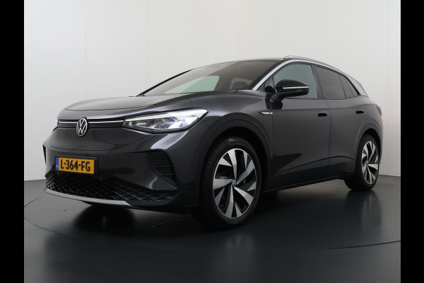 Volkswagen ID.4 First 82kWh SOH 93% Warmtepomp Trekhaak Camera Adap.Cruise Apple Carplay Android Auto Stuur+Stoelverwarming Navi Ecc Pdc Lmv 20" Led Wifi Voorruitverwarming DAB Isofix Verkeersbord detectie 1.000KG Trekgewicht 1e Eigenaar Dealeronderhouden