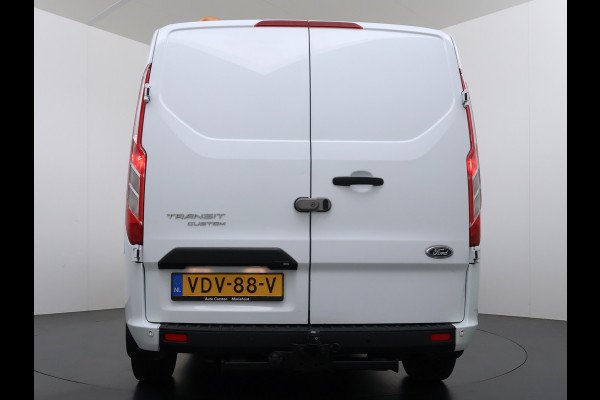 Ford Transit Custom 300 2.0TDCI 130PK Dubbele Cabine L2H1 Trekhaak Navi Camera Airco Cruise Control Pdc Trend DC Schuifdeur Betonplex Vloer Wandbetimmering Bott Inbouwkast Lane Assist 2.800KG Trekgewicht 1e Eigenaar