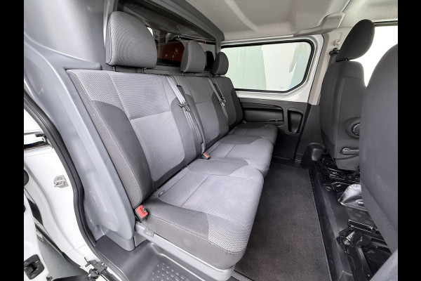 Renault Trafic 2.0 dCi 120 T29 L2H1 Dubbele Cabine Trekhaak Camera Navi Ecc Cruise Control Pdc DAB Business Euro 6 Betonplex Vloer Wandbetimmering Regen-Lichtsensor 2.000kg Trekgewicht 1e Eigenaar 5-Persoons