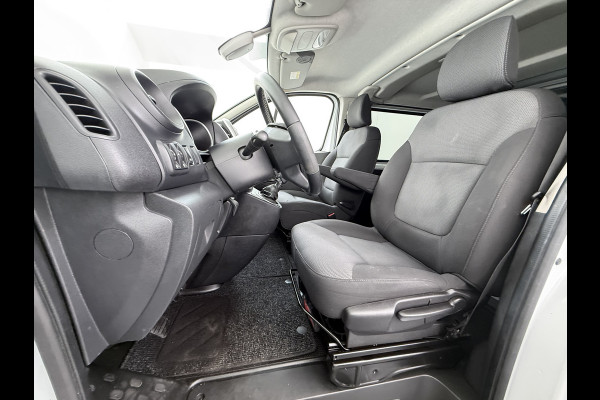 Renault Trafic 2.0 dCi 120 T29 L2H1 Dubbele Cabine Trekhaak Camera Navi Ecc Cruise Control Pdc DAB Business Euro 6 Betonplex Vloer Wandbetimmering Regen-Lichtsensor 2.000kg Trekgewicht 1e Eigenaar 5-Persoons