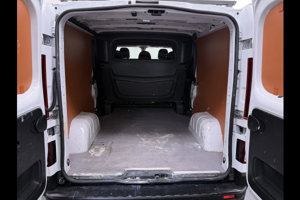 Renault Trafic 2.0 dCi 120 T29 L2H1 Dubbele Cabine Trekhaak Camera Navi Ecc Cruise Control Pdc DAB Business Euro 6 Betonplex Vloer Wandbetimmering Regen-Lichtsensor 2.000kg Trekgewicht 1e Eigenaar 5-Persoons