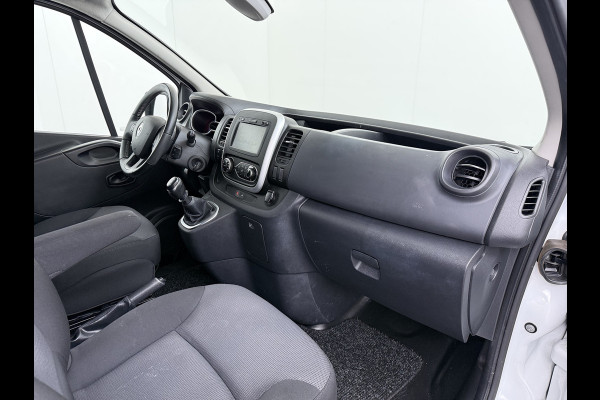 Renault Trafic 2.0 dCi 120 T29 L2H1 Dubbele Cabine Trekhaak Camera Navi Ecc Cruise Control Pdc DAB Business Euro 6 Betonplex Vloer Wandbetimmering Regen-Lichtsensor 2.000kg Trekgewicht 1e Eigenaar 5-Persoons