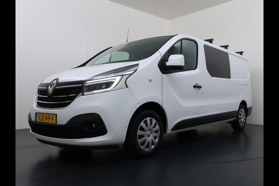 Renault Trafic 2.0 dCi 120 T29 L2H1 Dubbele Cabine Trekhaak Camera Navi Ecc Cruise Control Pdc DAB Business Euro 6 Betonplex Vloer Wandbetimmering Regen-Lichtsensor 2.000kg Trekgewicht 1e Eigenaar 5-Persoons