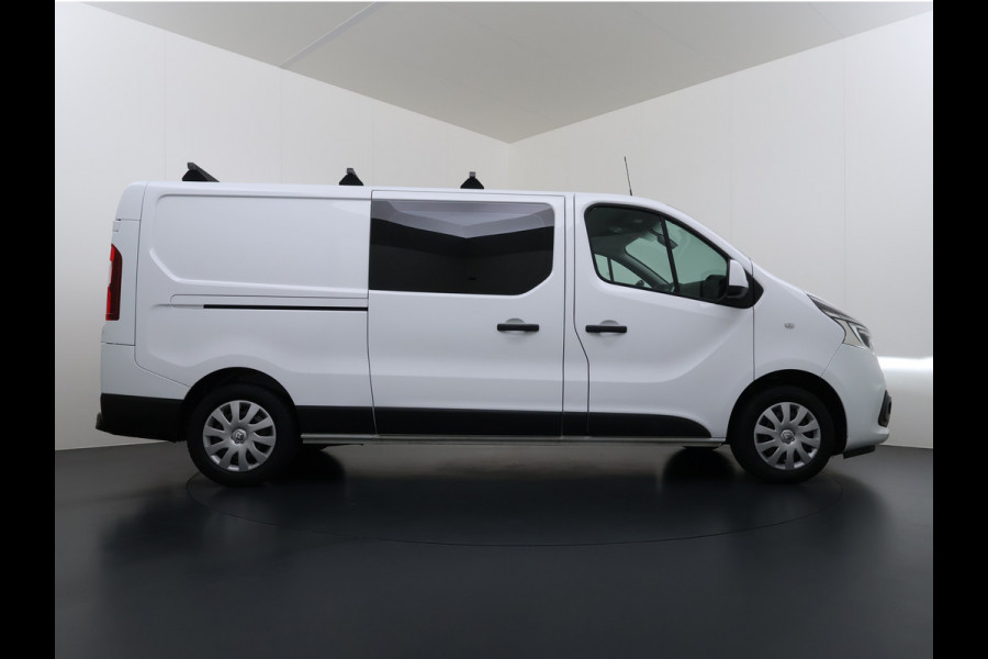 Renault Trafic 2.0 dCi 120 T29 L2H1 Dubbele Cabine Trekhaak Camera Navi Ecc Cruise Control Pdc DAB Business Euro 6 Betonplex Vloer Wandbetimmering Regen-Lichtsensor 2.000kg Trekgewicht 1e Eigenaar 5-Persoons