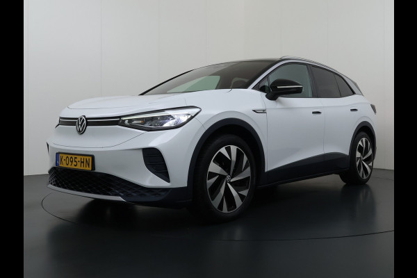 Volkswagen ID.4 First 82kWh SOH 90% Warmtepomp Trekhaak Camera Adap.Cruise Apple Carplay Android Auto Stuur+Stoelverwarming Navi Ecc Pdc Lmv 20" Led Wifi Voorruitverwarming DAB Isofix Verkeersbord detectie 1.000KG Trekgewicht 1e Eigenaar Dealeronderhouden
