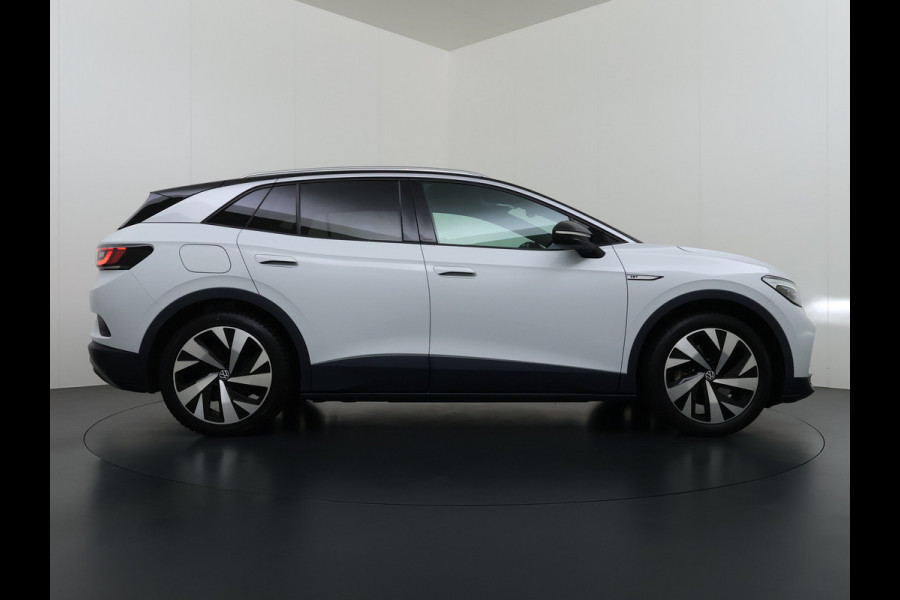 Volkswagen ID.4 First 82kWh SOH 90% Warmtepomp Trekhaak Camera Adap.Cruise Apple Carplay Android Auto Stuur+Stoelverwarming Navi Ecc Pdc Lmv 20" Led Wifi Voorruitverwarming DAB Isofix Verkeersbord detectie 1.000KG Trekgewicht 1e Eigenaar Dealeronderhouden