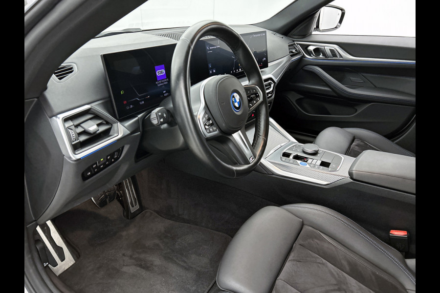 BMW i4 EDrive35 70 kWh M-sportpakket (1e Eig, Dealer OnderH, Navi Pro, Camera, Carplay, Addapt Cruise, StoelV, PDC V+A, Etc)