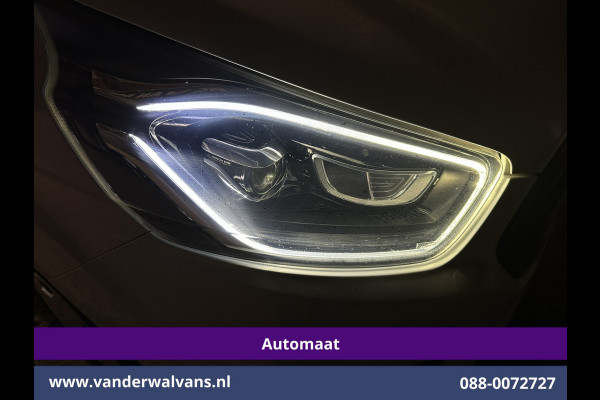 Ford Transit Custom 2.0 TDCI 131pk Automaat L2H1 Euro6 Airco | Xenon | Camera | Apple Carplay | LED | Adaptive Cruisecontrol | Trekhaak Android Auto, Stoelverwarming, Verwarmde voorruit, Dakdragers, Parkeersensoren, Bijrijdersbank, Achterklep