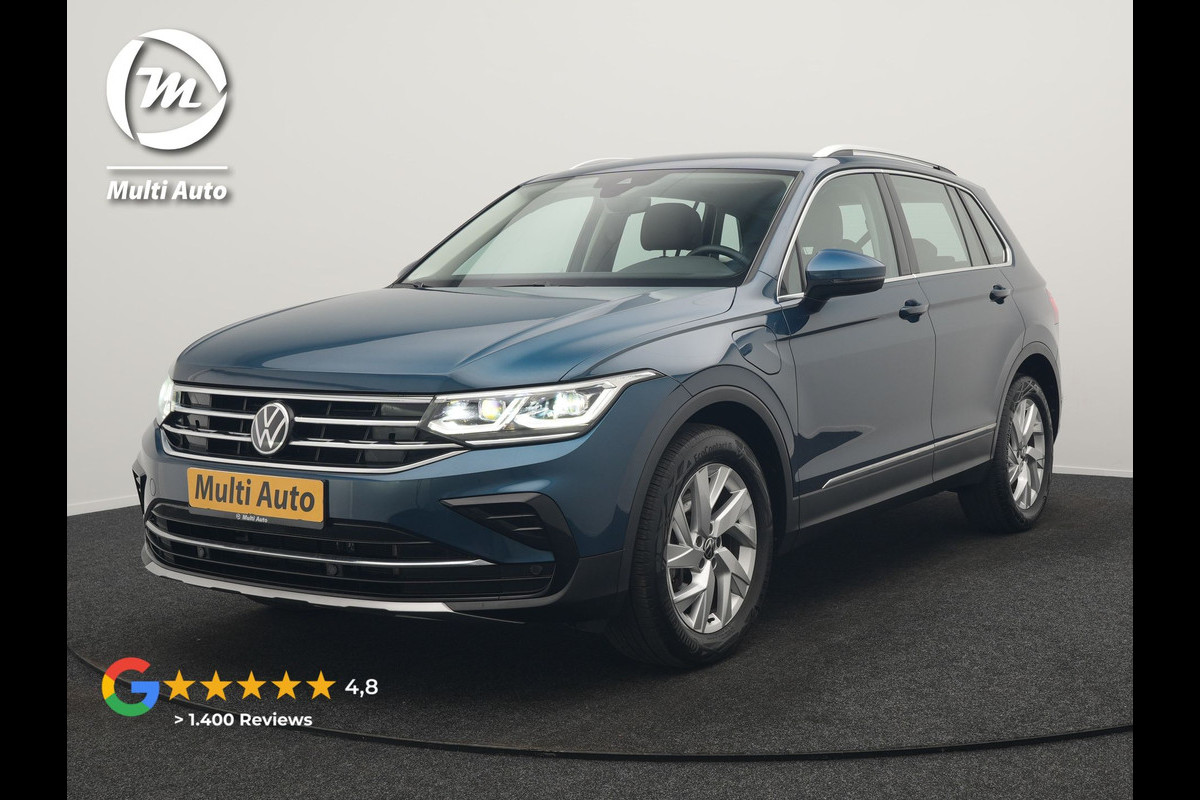 Volkswagen Tiguan 1.4 TSI eHybrid Elegance PHEV 245pk Dealer O.H. | Trekhaak Af Fabriek | Adaptive Cruise | IQ Light | Camera | Lederen Comfortzetels Memory & Verwarmd | Sfeerverlichting | Apple Carplay | Stuur Verwarmd | Navigatie | DAB | Plug In Hybrid |