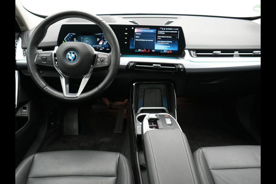 BMW iX1 xDrive30 Launch Edition 313pk 67 kWh Dealer O.H 96.5% SOH | Panodak | Adaptive Cruise | 360 Camera | Lederen Comfortzetels Massage & Memory | Head Up | Harman Kardon | Keyless |