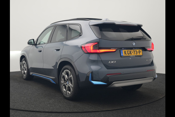 BMW iX1 xDrive30 Launch Edition 313pk 67 kWh Dealer O.H 96.5% SOH | Panodak | Adaptive Cruise | 360 Camera | Lederen Comfortzetels Massage & Memory | Head Up | Harman Kardon | Keyless |