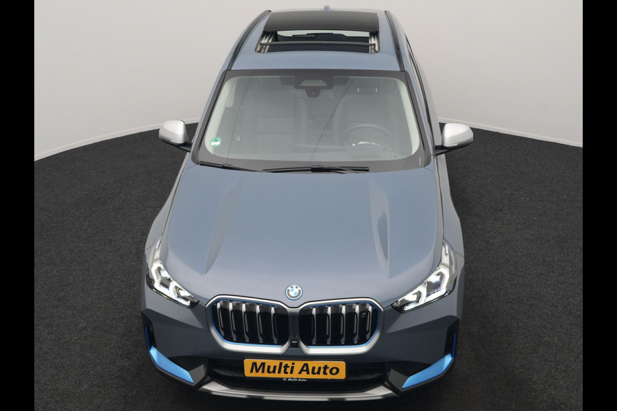 BMW iX1 xDrive30 Launch Edition 313pk 67 kWh Dealer O.H 96.5% SOH | Panodak | Adaptive Cruise | 360 Camera | Lederen Comfortzetels Massage & Memory | Head Up | Harman Kardon | Keyless |