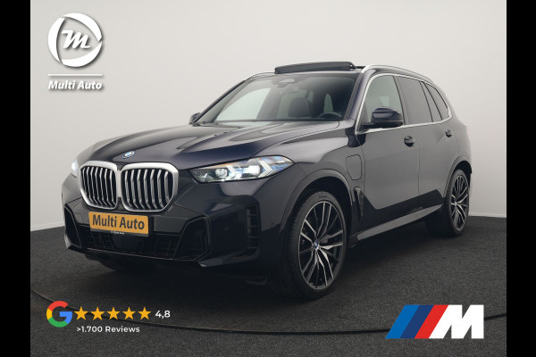 BMW X5 xDrive50e M Sport PHEV 490pk Dealer O.H. | Panodak Sky Lounge | Luchtvering | Head Up | 360 Camera | Harman / Kardon | Nappa Lederen Comfortstoelen Memory & Verwarmd | Carbon Schwarz | Apple Carplay | Keyless | Blis | 22"L.M | Plug In Hybrid |