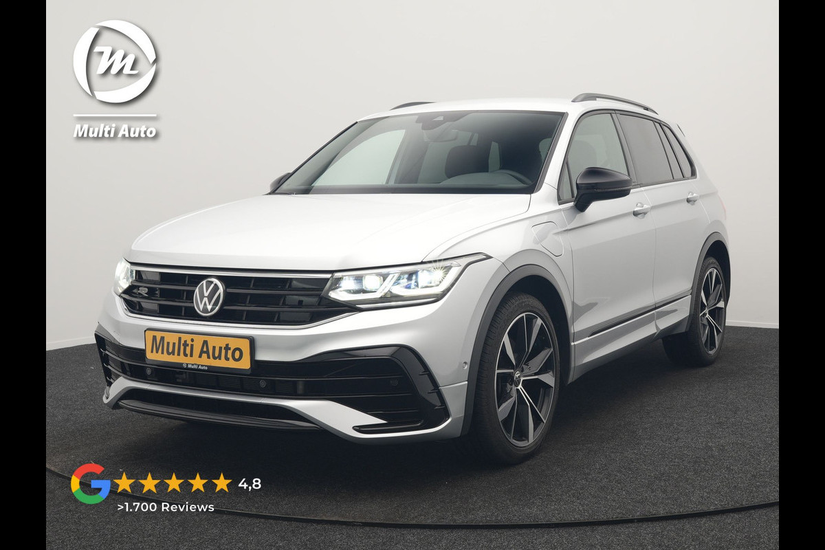 Volkswagen Tiguan 1.4 TSI eHybrid R-Line PHEV 245pk Dealer O.H | Trekhaak Af Fabriek | Adaptive Cruise | IQ Light | Adaptive Onderstel | Camera | Alcantara Sportstoelen & Stuur Verwarmd | Blis | Keyless | Sfeerverlichting | Virtual | Navigatie | DAB | 20"L.M | Plug In Hybrid |