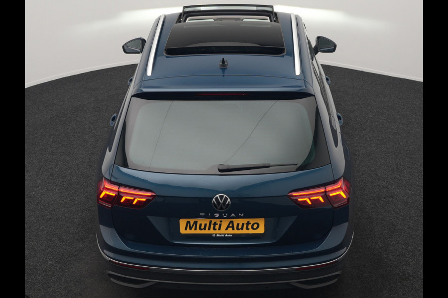 Volkswagen Tiguan 1.4 TSI eHybrid Active PHEV 245pk Dealer O.H. | Trekhaak Af Fabriek | Panodak | Adaptive Cruise | Camera | Voorstoelen Verwarmd | IQ Light | Sfeerverlichting | Stuur Verwarmd | Keyless | Blis | Apple Carplay | Plug In Hybrid |