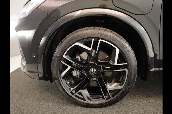 Volkswagen Tiguan 1.5 eHybrid R-Line Edition 272 pk Automaat (DSG) | Verlengde garantie | Navigatie | Panoramadak | Trekhaak (wegklapbaar) | Parkeersensoren (Park assist) | Rondomzicht camera| Lederen bekleding | Stoelverwarming v/a | R-Line |