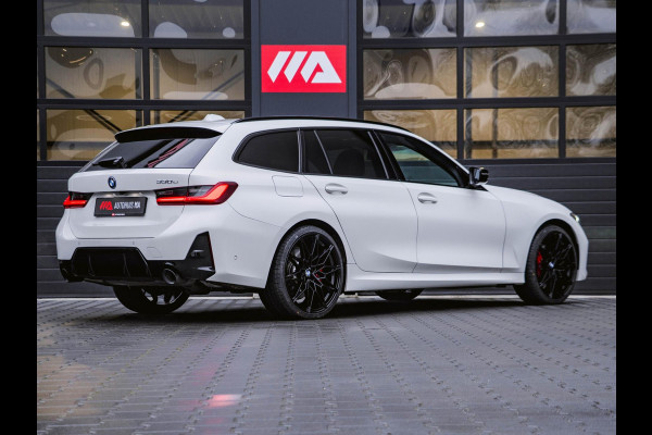 BMW 3 Serie Touring 330e M-Sport Premium Select|Panoramadak|Headup|Memorystoelen|Camera|Carplay|Cruise|Sfeerverlichting